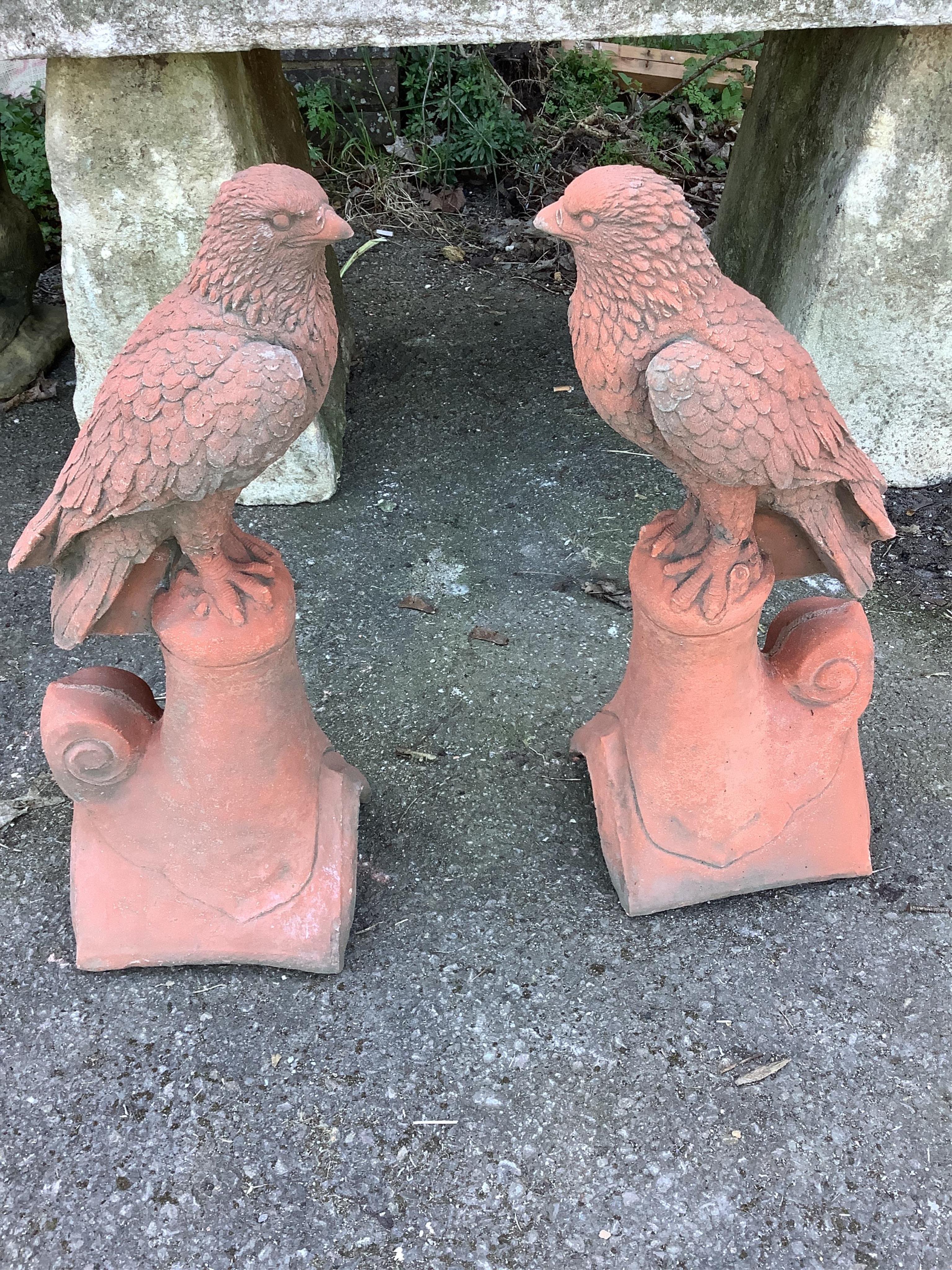 A pair of cast eagle ridge tiles, height 54cm. Condition - fair to good